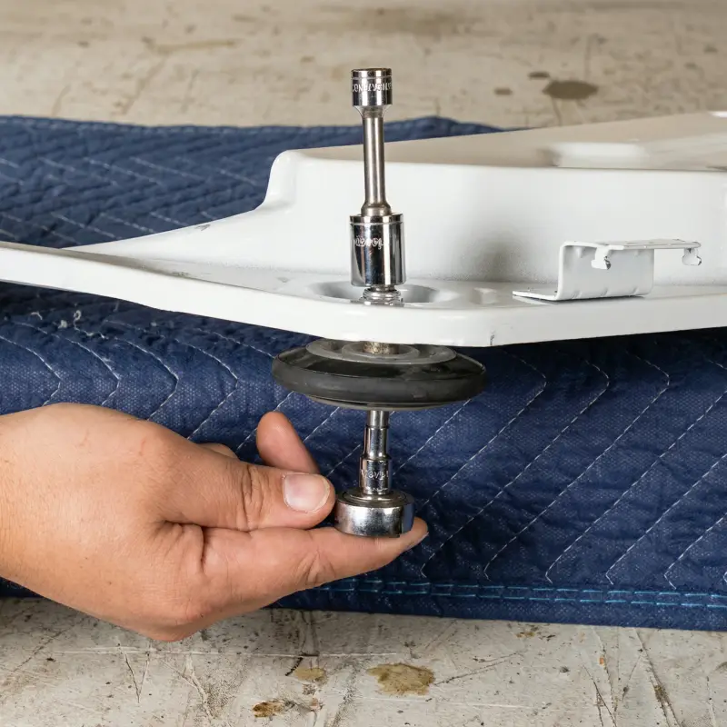 New OEM LG dryer drum rollers installed on axles