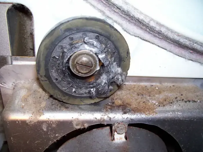 Worn LG dryer drum rollers — flat surface causing grinding noise